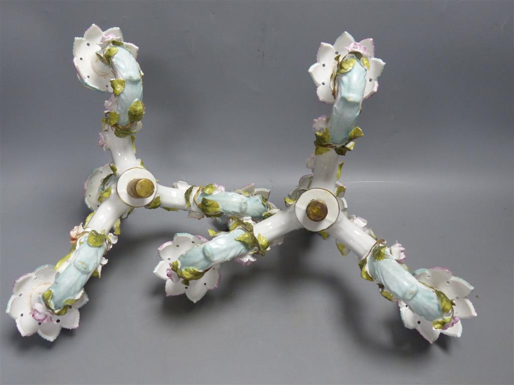 A pair of early 20th century Plaue porcelain figural candelabra, overall height 48cm